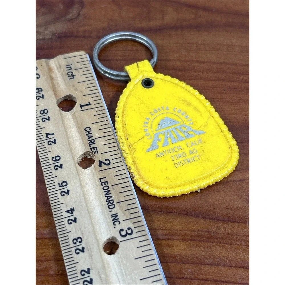 Vintage Contra Costa County Fair Antioch Californina Yellow Keychain From 1987